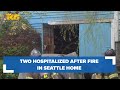 Two people hospitalized after fire at Seattle home