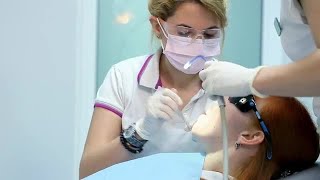 Two Female Dentists At Work Stock Video