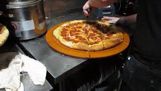 Cutting Pizzas Into Equal Slices Made Easy When Using The Portion PadL