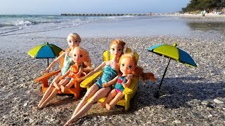 Elsa and Anna toddlers at the beach - prank - slide - boat - dog - water fun - splash