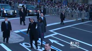 Obamas walk down Pennsylvania Avenue in 2013 inaugural parade