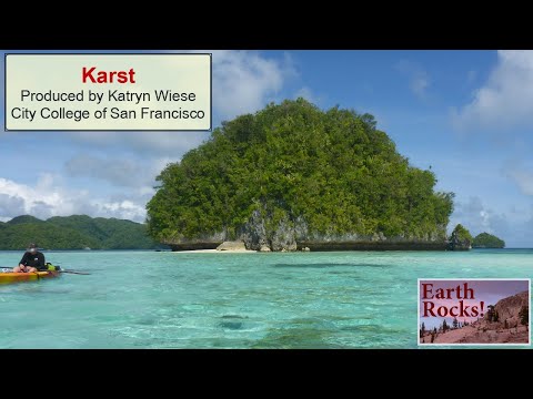 What type of rock is typically associated with karst topography?