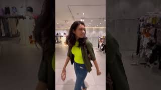 Friends Styling each other in a Mall