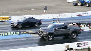 RAM 1500 TRX Truck With Supercharged 6.2L HEMI V8 Engine Drag Race Vs. BMW 5 Series (?) Sedan