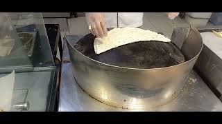 Baking Arabic Cheese Bread see the Chef in Carrefour Alain Mall (UAE) .