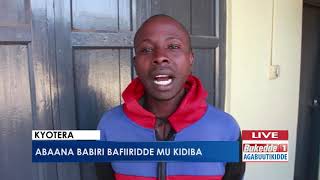 Agabuutikidde:    Abaana babiri bafiiridde mu kidiba.