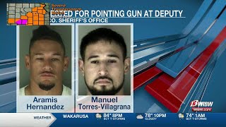 Two Topeka men facing weapons crimes after pointing firearm at officer in Shawnee County