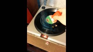 Does anyone else play an old record wet?