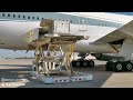 How Airport Staff Offload a ULD (Unit Loading Device) Container From Airplanes