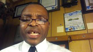 Minister Raymond E Robinson