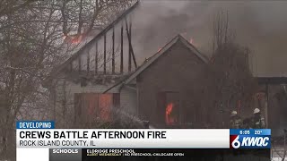 Crews battle house fire in Taylor Ridge