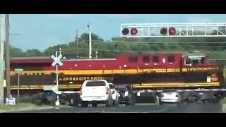 KCSM power trailing on UP stack train with crossing malfunction in Mt. Vernon, Illinois