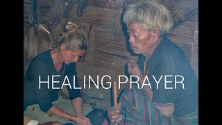 Healing prayer by the shaman of Mu Cham (Makyan, Ma Kyan, Makyam), a Naga village in Myanmar / Burma