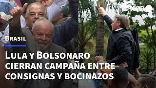 Lula y Bolsonaro cierran campaña en Brasil entre consignas y bocinazos | AFP