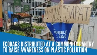 Ecobags distributed at a community pantry to raise awareness on plastic pollution