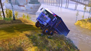 Tense moments when a large truck reverses on a sand excavation slope and almost overturns