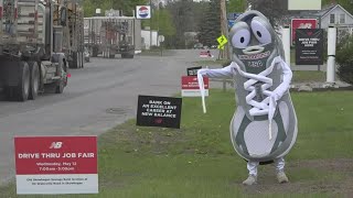 New Balance holds a drive thru job fair for several job openings
