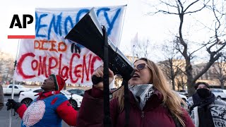 People protesting Elon Musk and DOGE gather outside the Office of Personnel Management