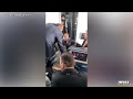 man held down by passengers and flight crew after attempting to breach cockpit