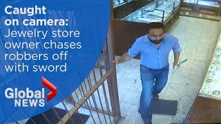 Jewelry store owner chases robbery suspects off with sword