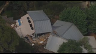 Victoria beach house crashes down hill