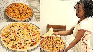 ከመይ ገርና ፒዛ  ኣብ ገዛና ንሰርሕ[ how to make pizza ]