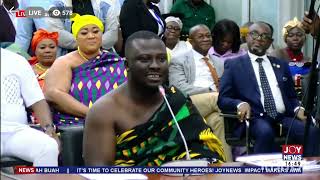 Ashanti Regional Minister-designate Dr. Frank Amoakohene explains the meaning of his Kente cloth