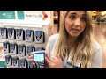 sarah merwin demonstrates the new hand scanners at kroger