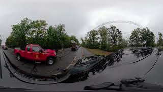 Vehicles leaving staging area en-route to Church/Cemetery honoring Mr. John Doherty of Melrose DPW