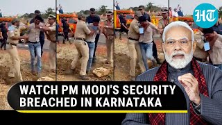 Modi's security breached in Karnataka; Man runs towards PM's convoy in Davanagere