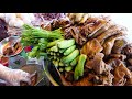 woman of braised pork intestines cambodian street food