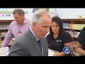 attorney thomas j. henry providing thousands of student with school supplies