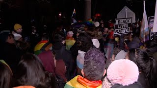 Dozens protest Stoughton Public Schools' policy on flags, posters