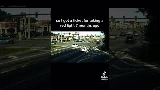 He got a ticket for running a red light 7 months later