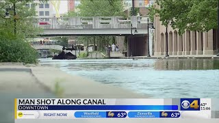 Police: Suspect detained after shooting on downtown canal