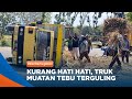 MAGETAN - Kurang Hati Hati, Truk Muatan Tebu Terguling