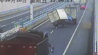 Swerving truck in China narrowly avoids disaster