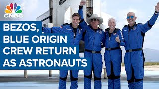 Jeff Bezos and Blue Origin crew return as astronauts after historic launch