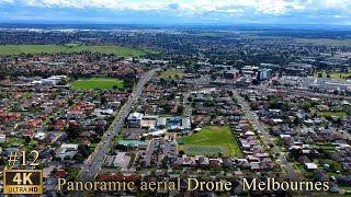 Panoramic aerial Drone view of Melbournes and looking down at Houses roads and Parks | Royalty Free