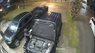 shows police interrupting auto theft in progress outside Toronto home
