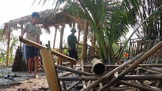 Working Together to Clean Up the Destroyed Home After the Storm as the Floodwaters Recede