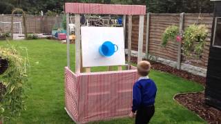 DIY Ball & Bucket carnival game (in pallet carnival stall)