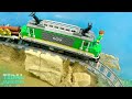 train crashes from bridge into flooded canyon tsunami dam breach experiment lego train disaster