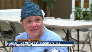 Neighbors serve hot meals to flood victims