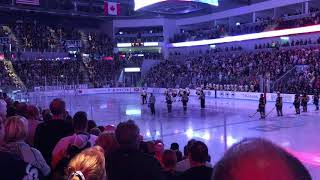 The crowd at Pegula Ice Arena singing the national anthem before the Sabres vs. the Penguins game