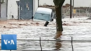 Video Shows Car Being Swept Away by Floodwaters in Spain