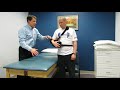 How to remove a sling after shoulder surgery with assistance