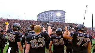 Fans, Players in University of Iowa Stadium Turn to Wave at Kids in Hospital