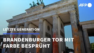 Letzte Generation besprüht Brandenburger Tor mit Farbe | AFP