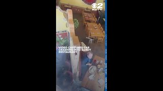 Video captures car crashing into Sandy restaurant